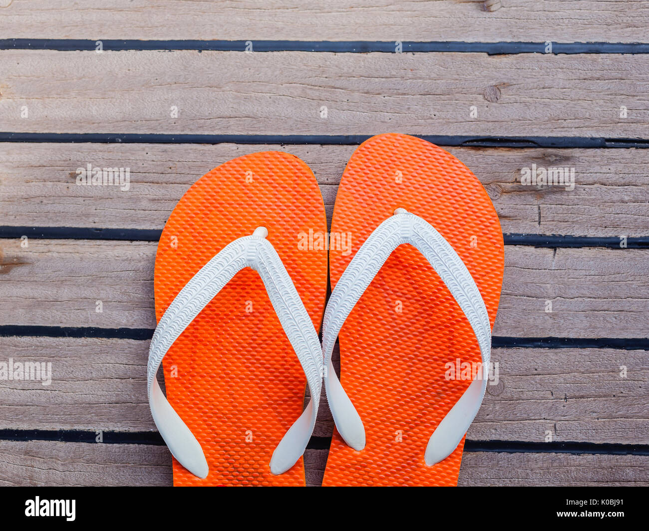 Flip flops on sailing yacht floor for summer background Stock Photo Alamy