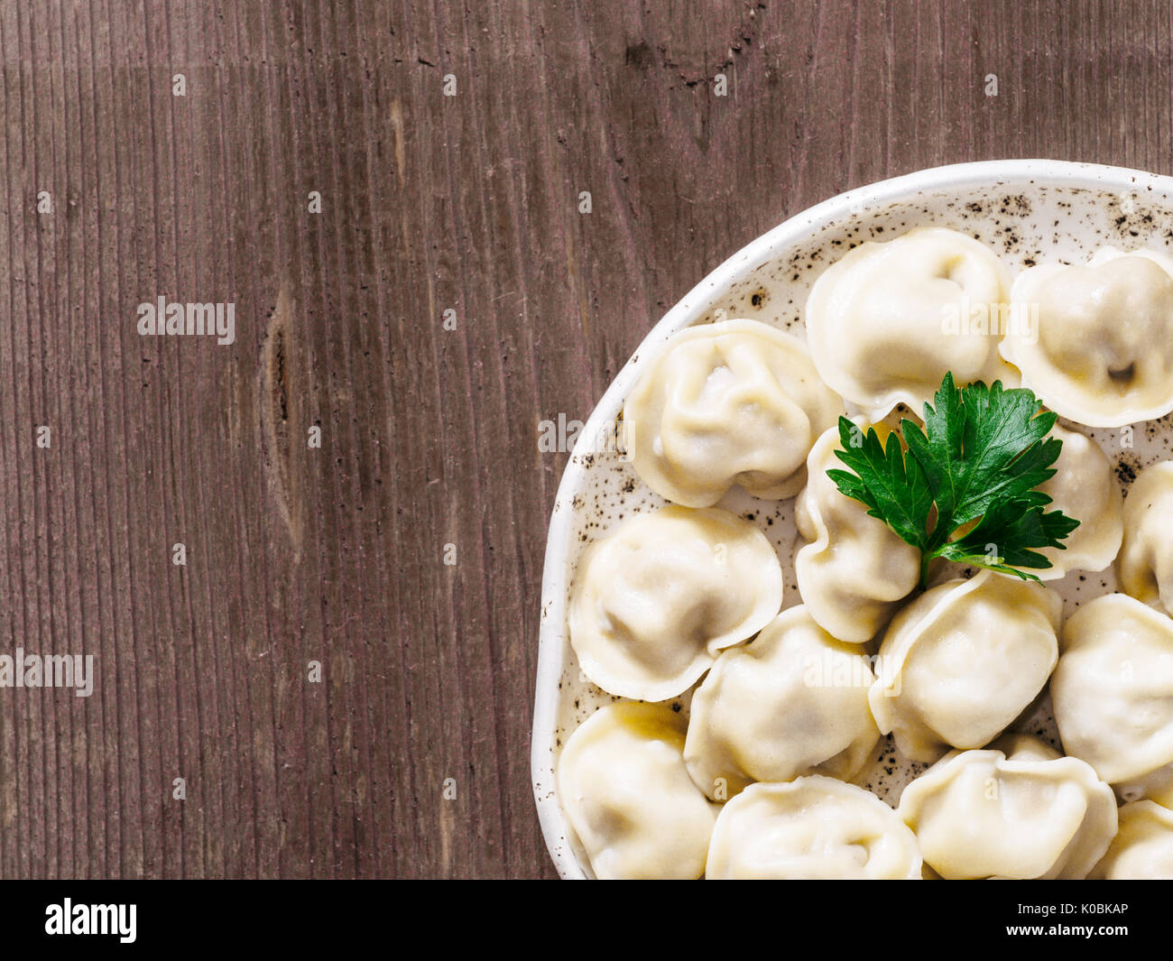 Russian pelmeni, ravioli, dumplings with meat Stock Photo