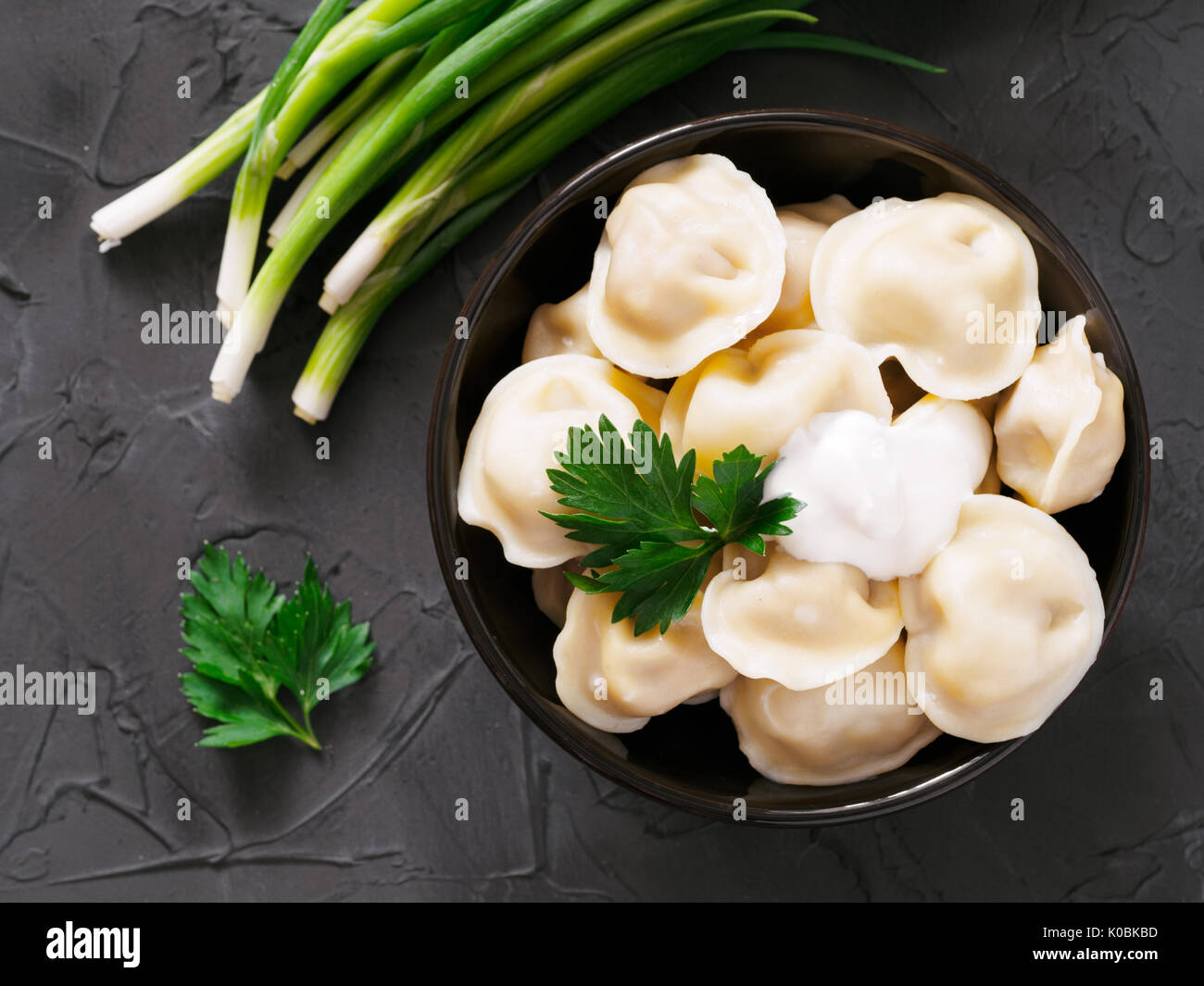 Russian pelmeni, ravioli, dumplings with meat Stock Photo