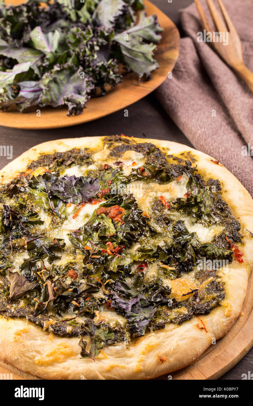 Kale pizza with mozzarella Stock Photo