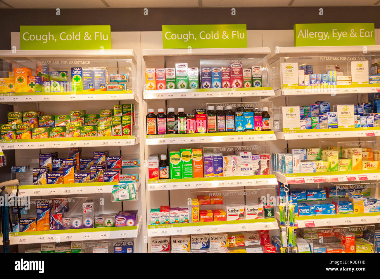 Cough cold and flu remedies in a chemist shop,pharmacy shelf