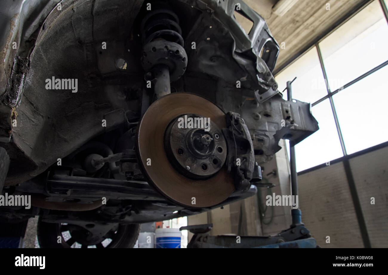 View of brakes disks and shock absorbers of a car Stock Photo