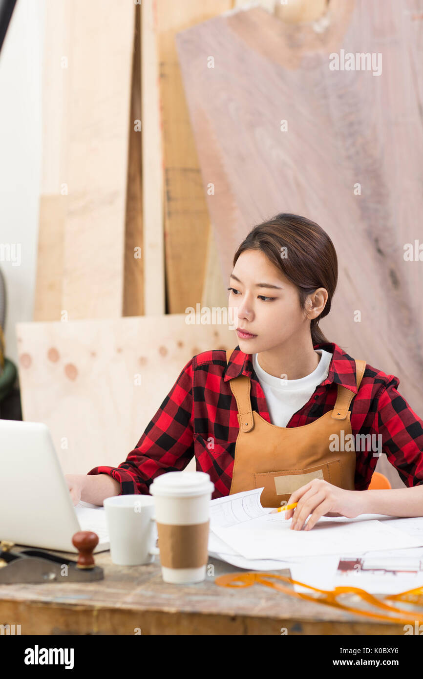 Portrait pg female furniture designer working Stock Photo Alamy