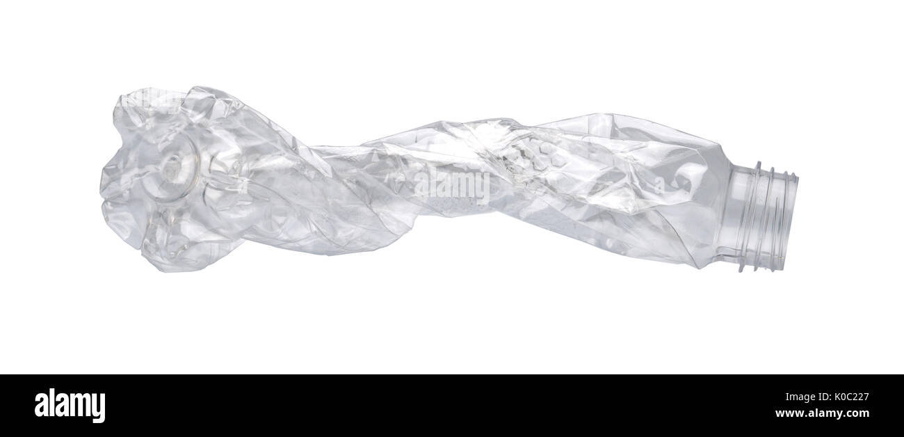 Waste of transparent plastic bottles that are twisted and deformed isolated on white background with copy space Stock Photo