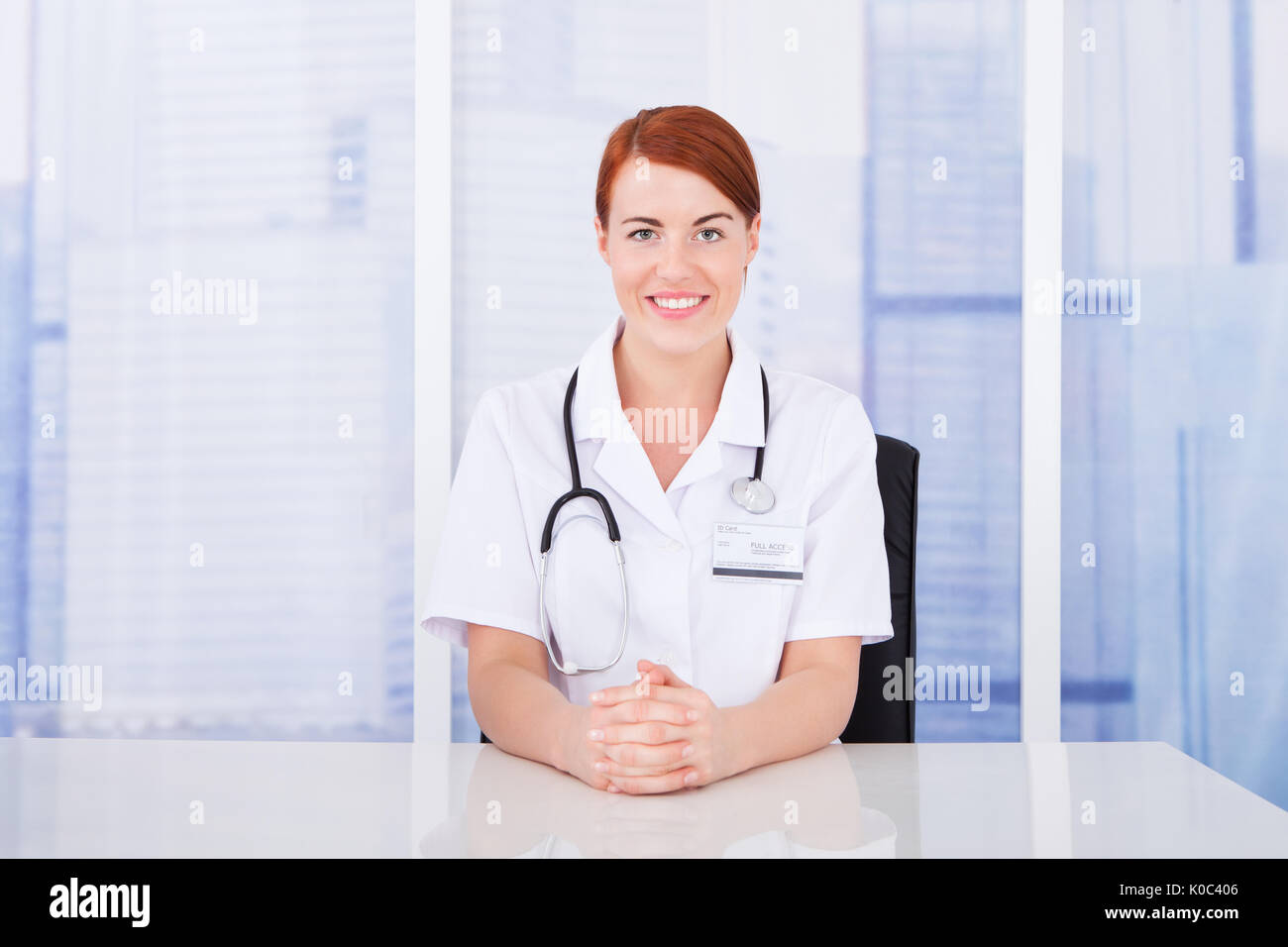 Beautiful young female doctor hi-res stock photography and images - Alamy