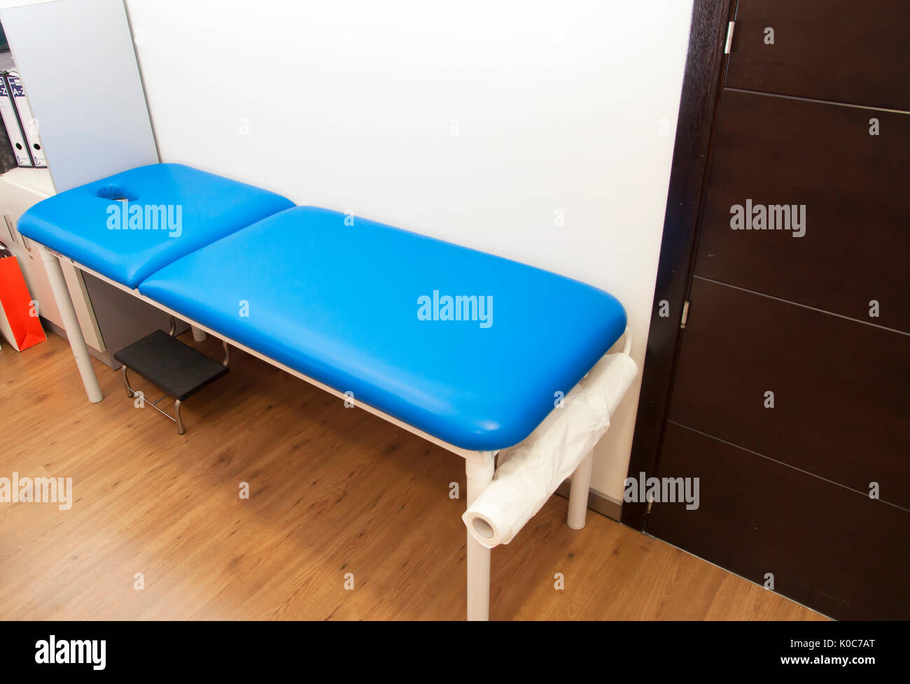 A blue massage table Stock Photo
