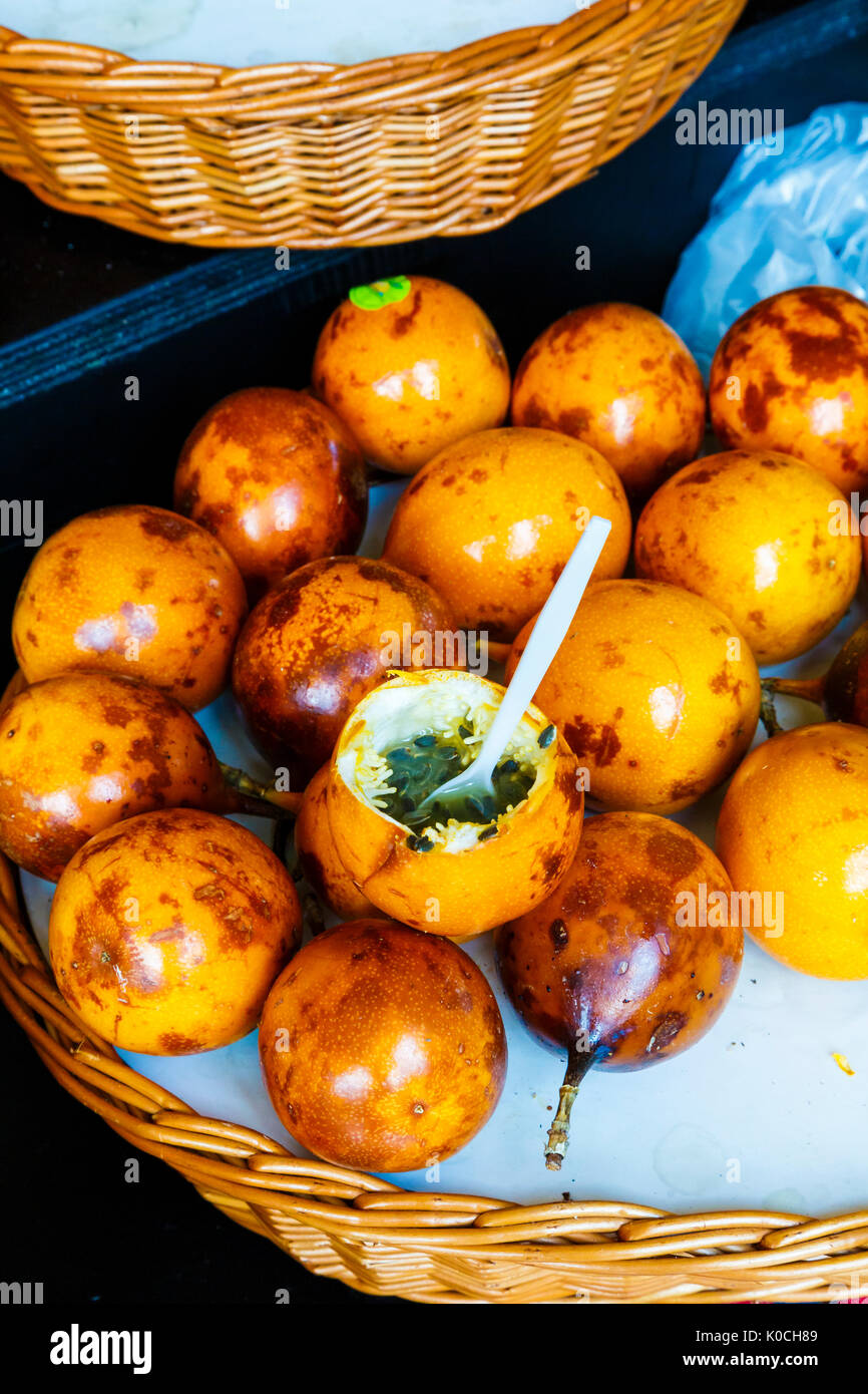 Maracuya fruits in a basket. Fruits and vegetables stall. Stock Photo