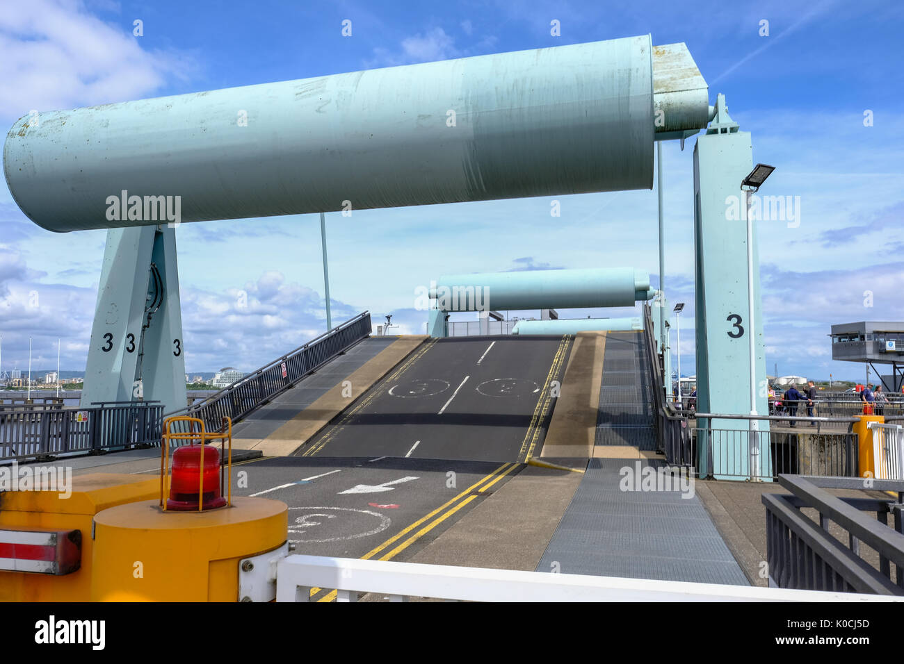 Cardiff Bay, Wales - May 21, 2017: Barrage,  closed with road going down. Taken on a bright sunny early summer day. Stock Photo
