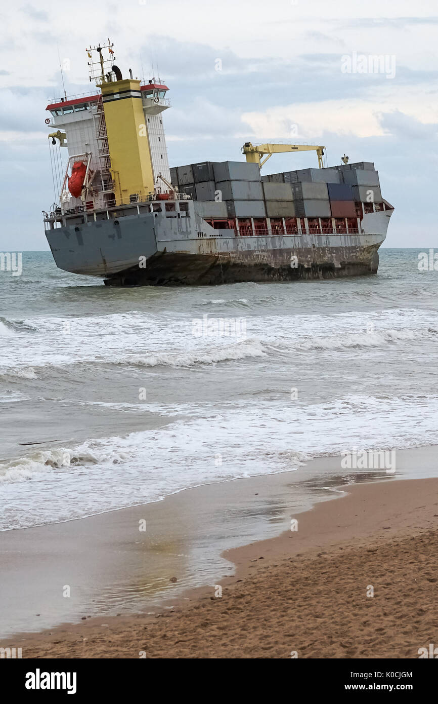 Cargo ship aground in front of Valencia (El Saler) coastline by a big storm in previous days Stock Photo