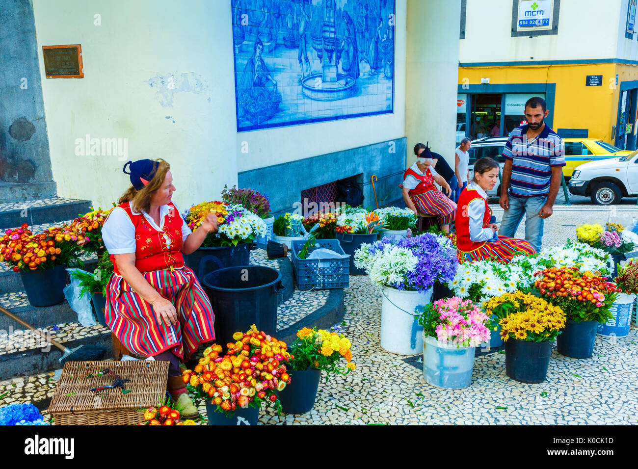 Woman selling flowers. Stock Photo