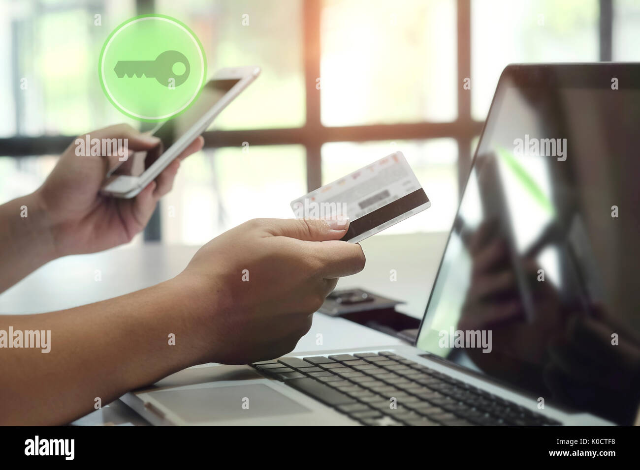 electronic key concept, smartphone and card on hand smart home