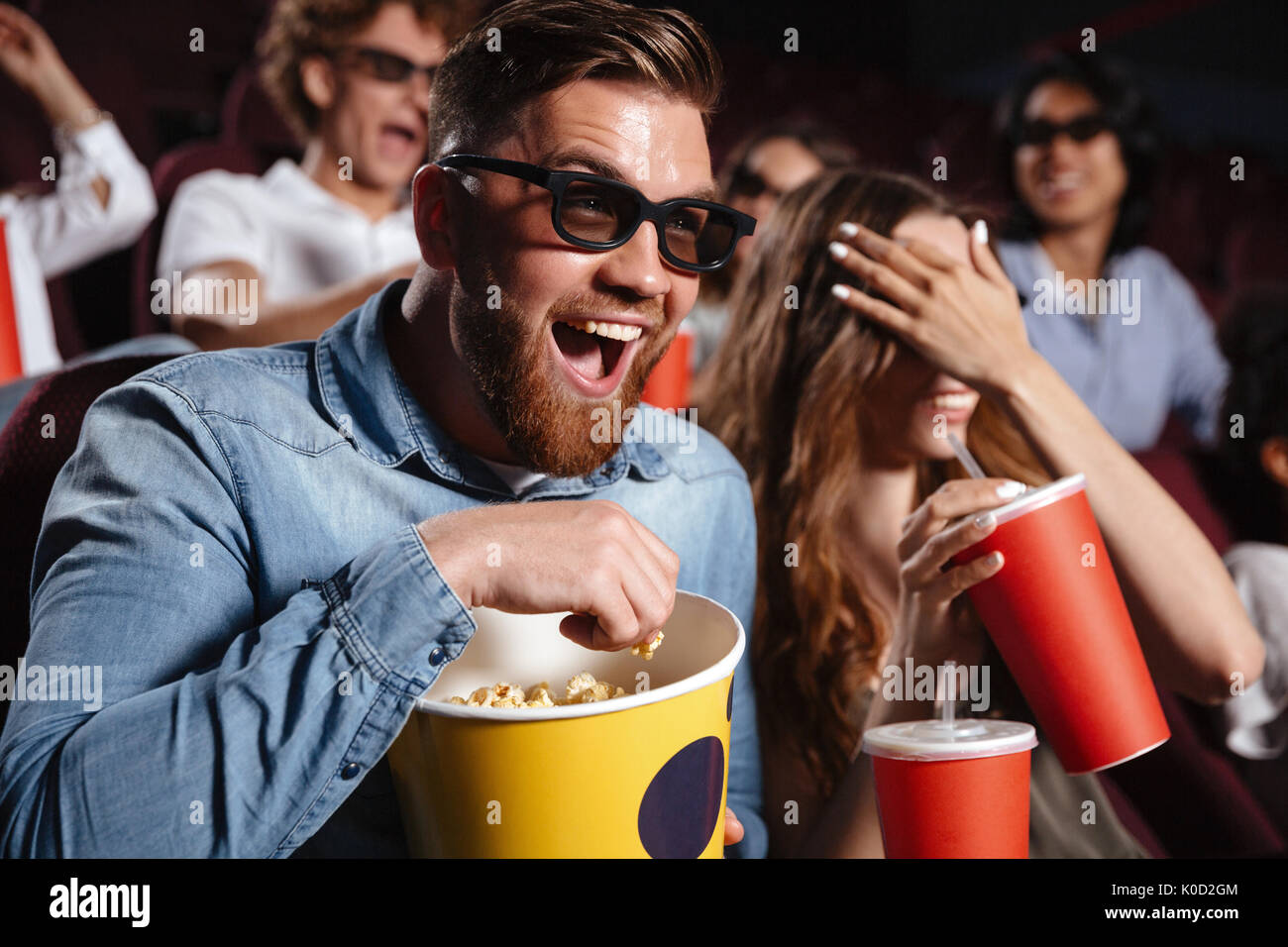 Eating Popcorn Laughing