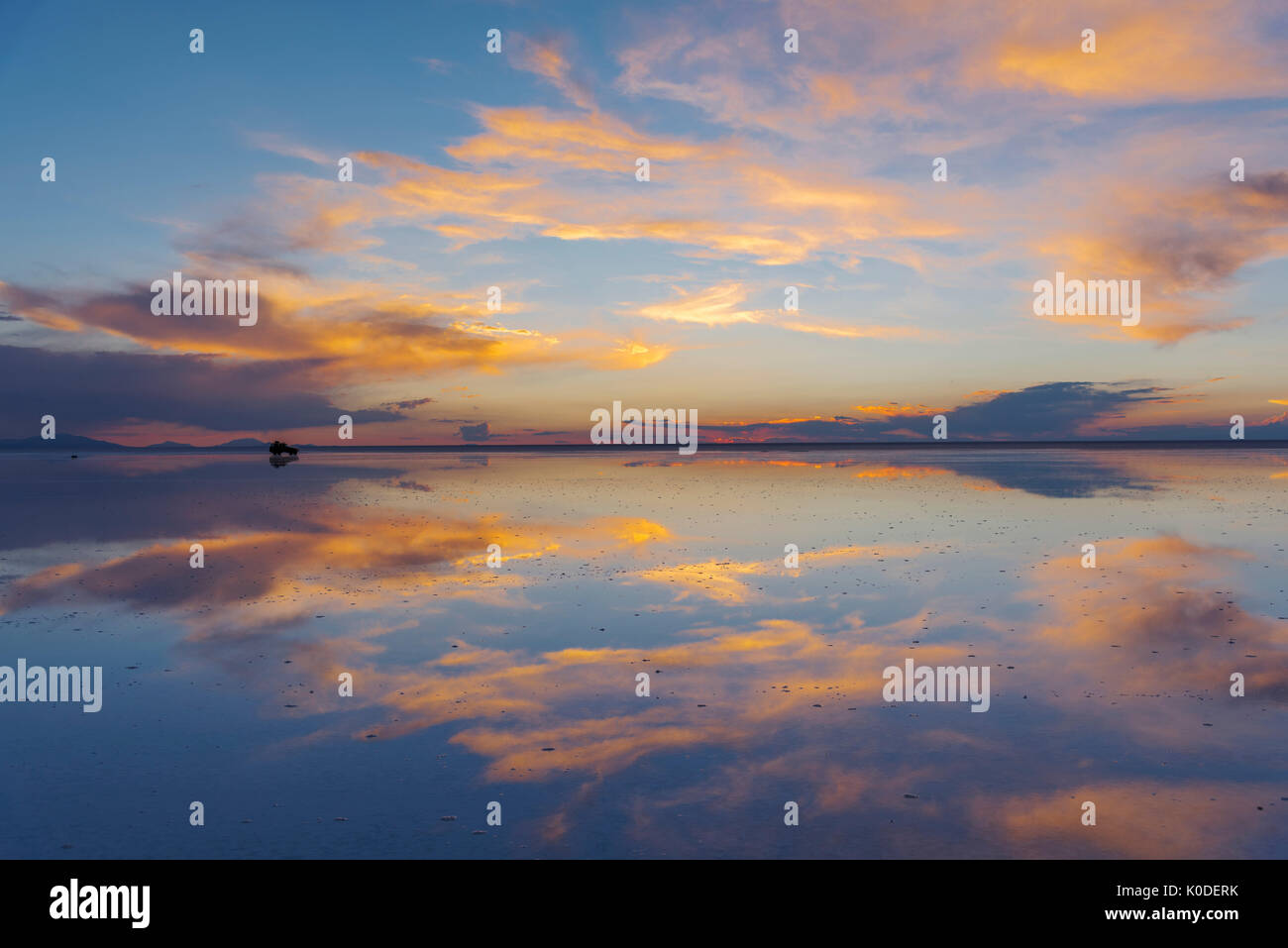 South America, Andes, Altiplano, Bolivia, Salar de Uyuni, sunset with reflection Stock Photo