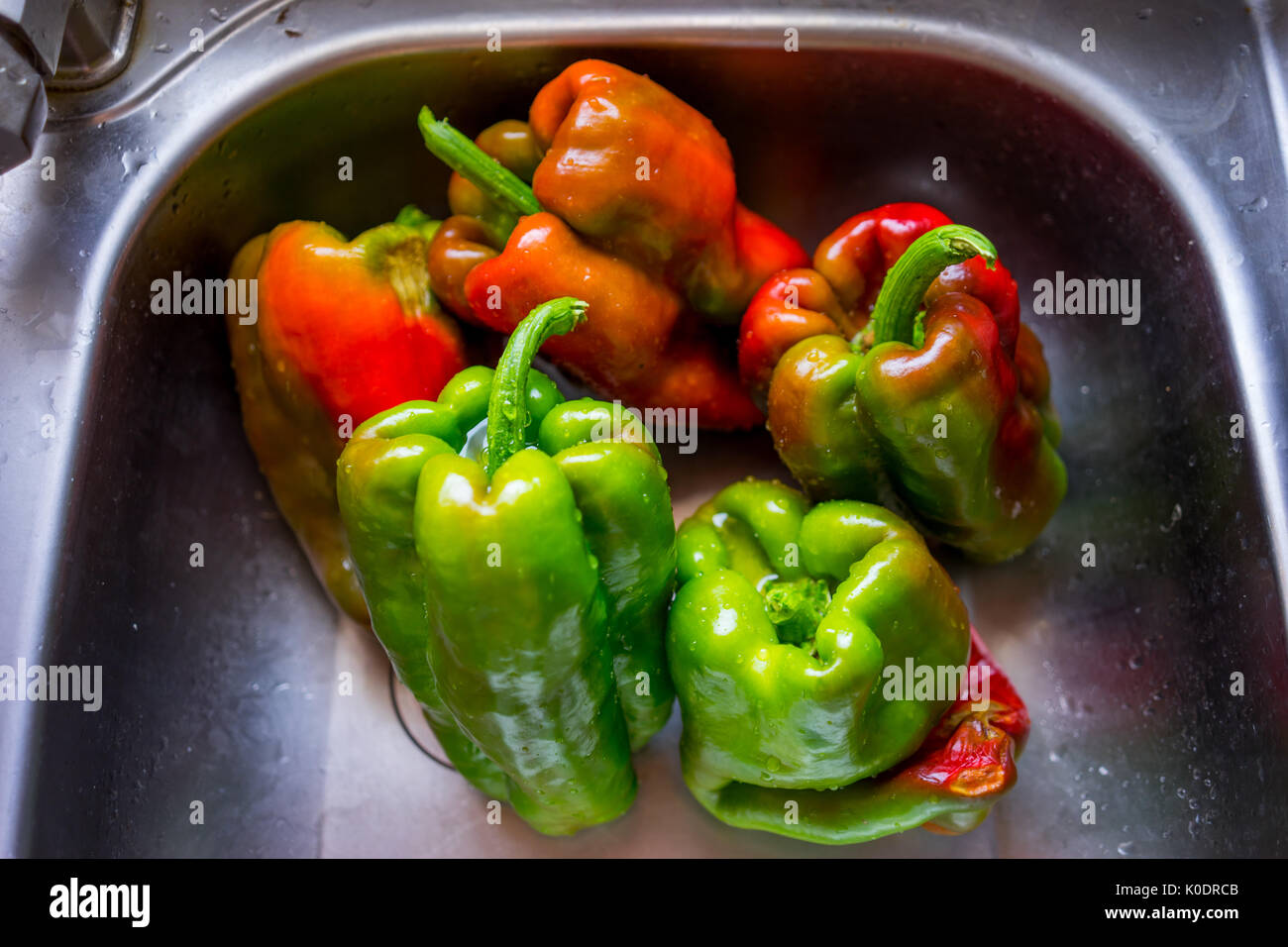 close up view of red and green peppers Stock Photo - Alamy