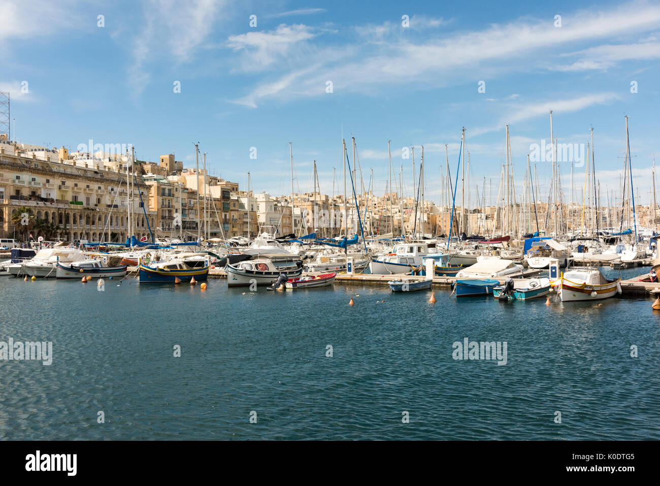 Pleasure boats and yachts moored in the grand Harbour at Birgu Malta Stock Photo