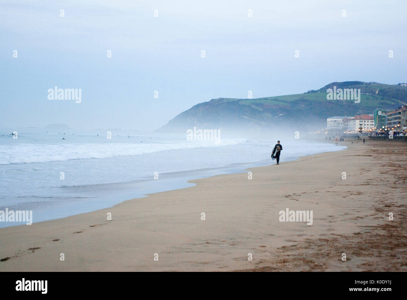 One young surfer on Zarautz beach in Basque Country, Spain Stock Photo
