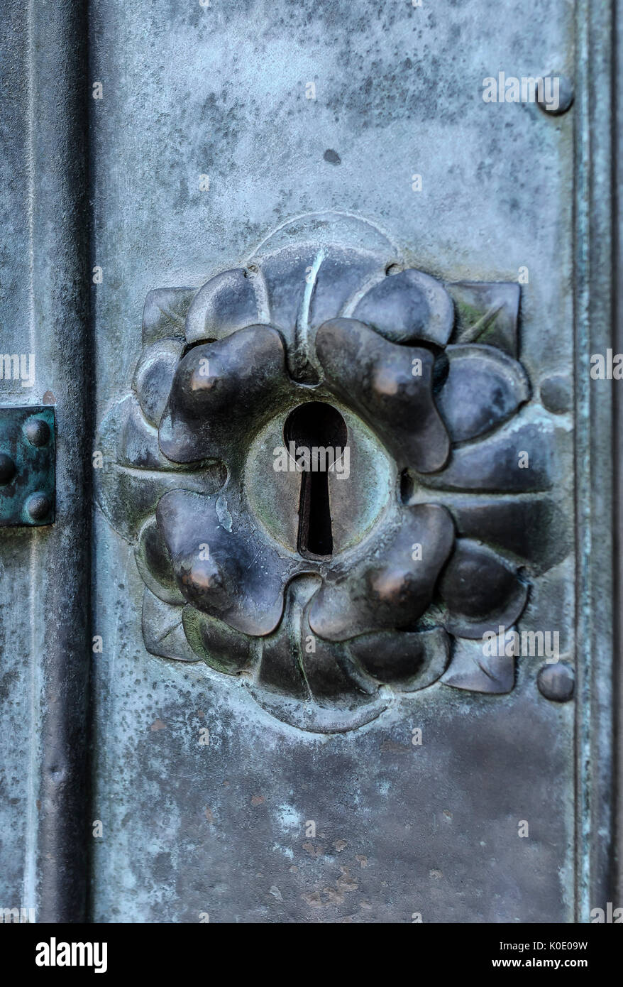 Keyhole in forged door. Stock Photo