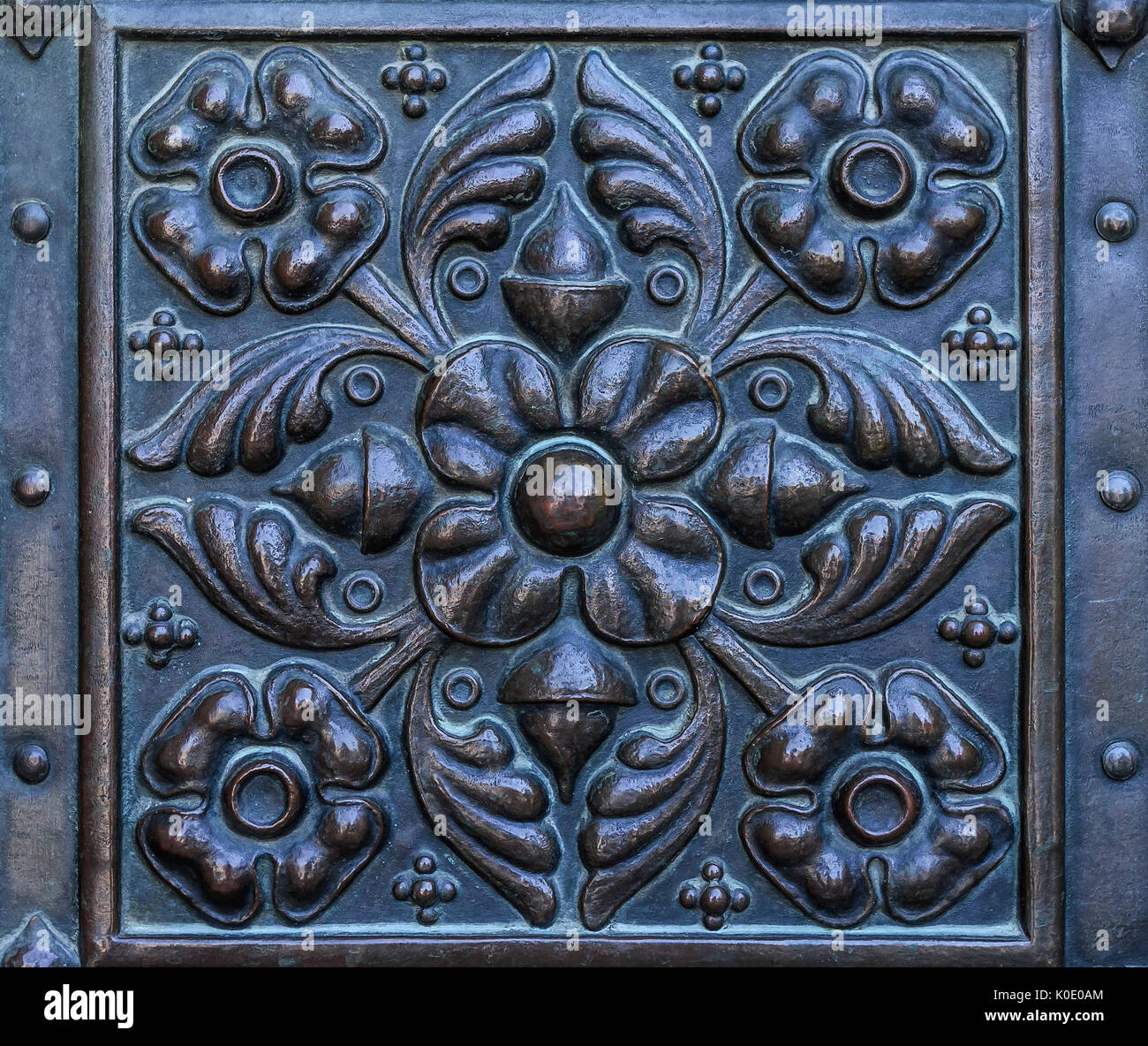 Elements of antique forging on the door. Stock Photo