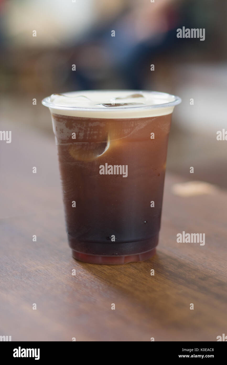 Sparkling Nitro Cold Brew Coffee in plastic take away cup ready to drink Stock Photo