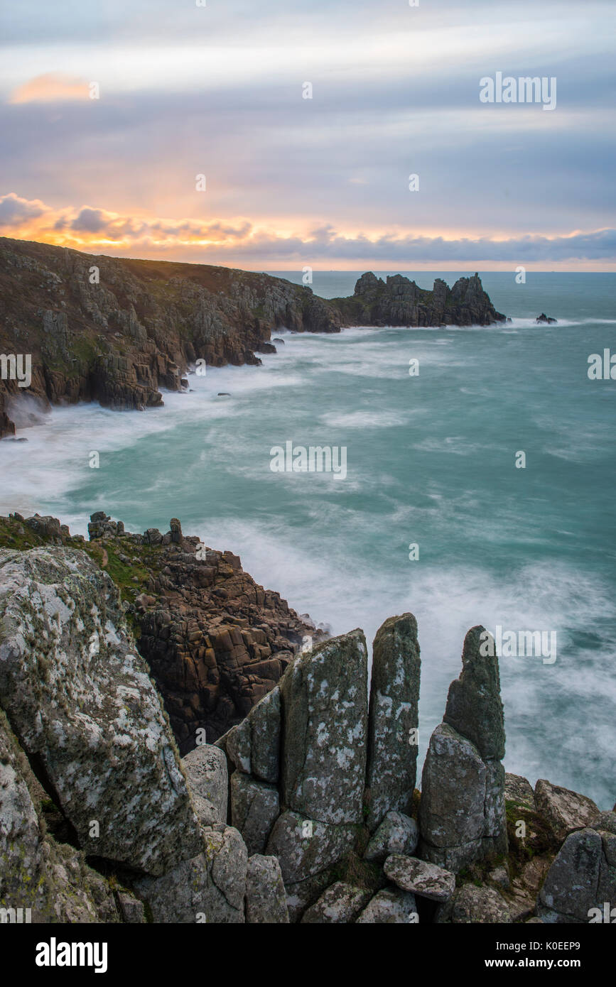 The view towards Logan Rock from Treen in West Cornwall. Stock Photo