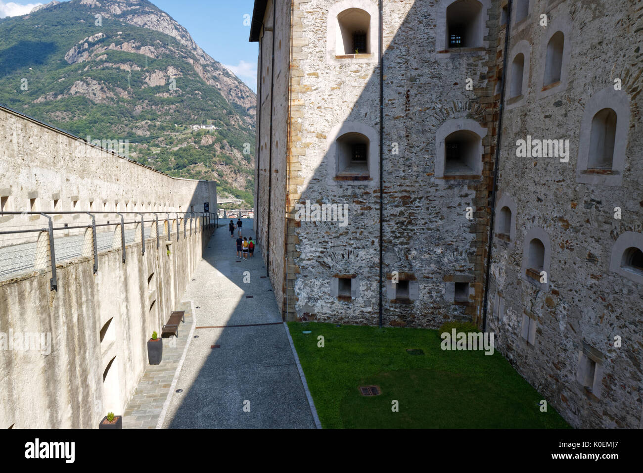 Fort Bard, Valle d'Aosta, Italy - August 18, 2017: Historic military construction defence Fort Bard. Touristic medieval fortress in Italian Alps. Loca Stock Photo