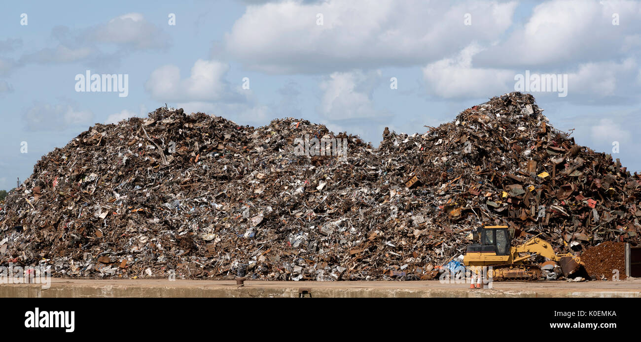 Pile of scrap metal waiting to be exported to China for melting down. Southampton Docks UK August 2017 Stock Photo