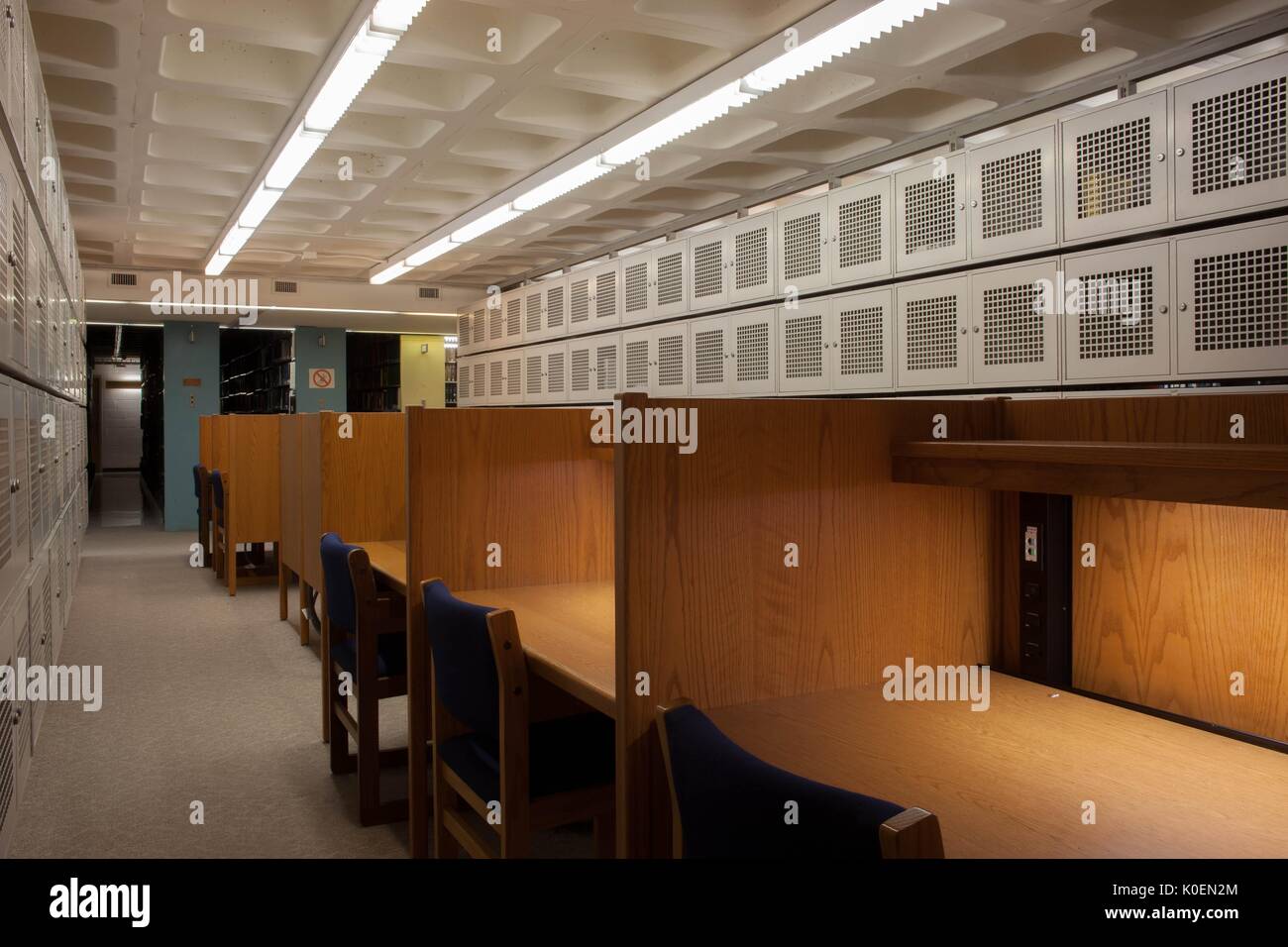An empty row of cubicles with lockers on either side of them, in the Milton S. Eisenhower Library on the Homewood campus of the Johns Hopkins University in Baltimore, Maryland, 2014. Courtesy Eric Chen. Stock Photo