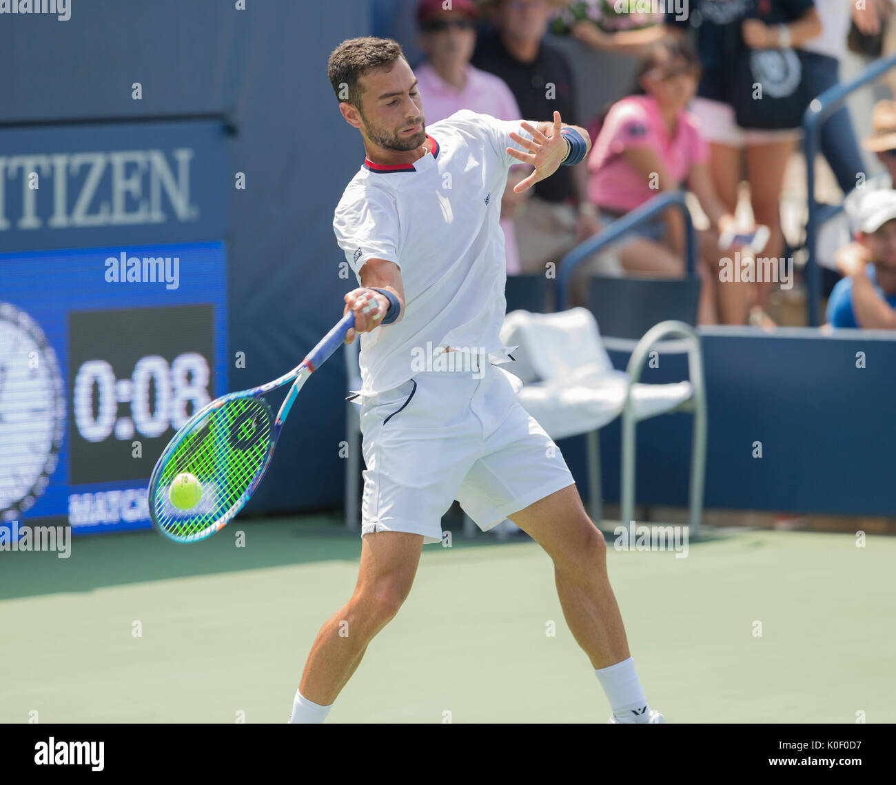 New York, USA. 22nd Aug, 2017. Noah Rubin of USA returns ball during qualifying game against Tobias Kamke of Germany at US Open 2017 Credit: lev radin/Alamy Live News Stock Photo