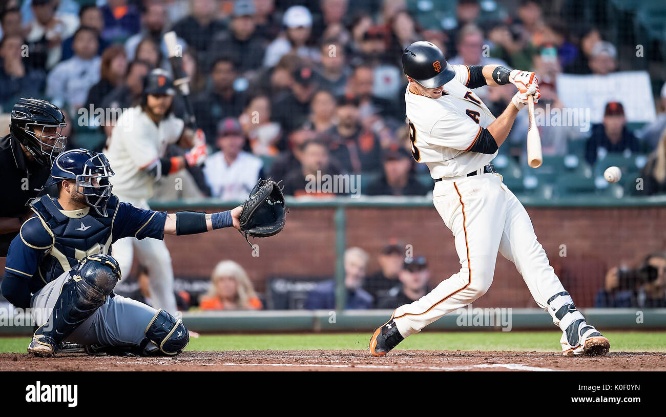 San Francisco, USA. 22nd Aug, 2017. San Francisco Giants catcher Buster Posey (28) hitting a lead off single in the second inning, during a MLB game between the Milwaukee Brewers and the San Francisco Giants at AT&T Park in San Francisco, California. Credit: Cal Sport Media/Alamy Live News Stock Photo