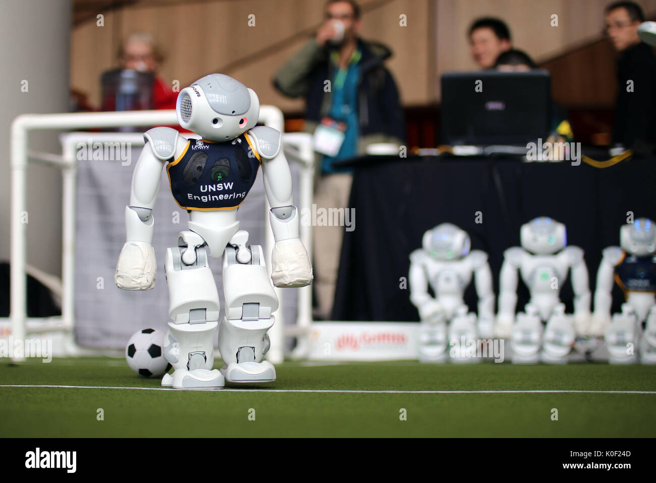 Melbourne, Australia. 23rd Aug, 2017. A robot football game is held during the 2017 International Joint Conference on Artificial Intelligence in Melbourne, Australia, Aug. 22, 2017. Credit: Xinhua/Alamy Live News Stock Photo