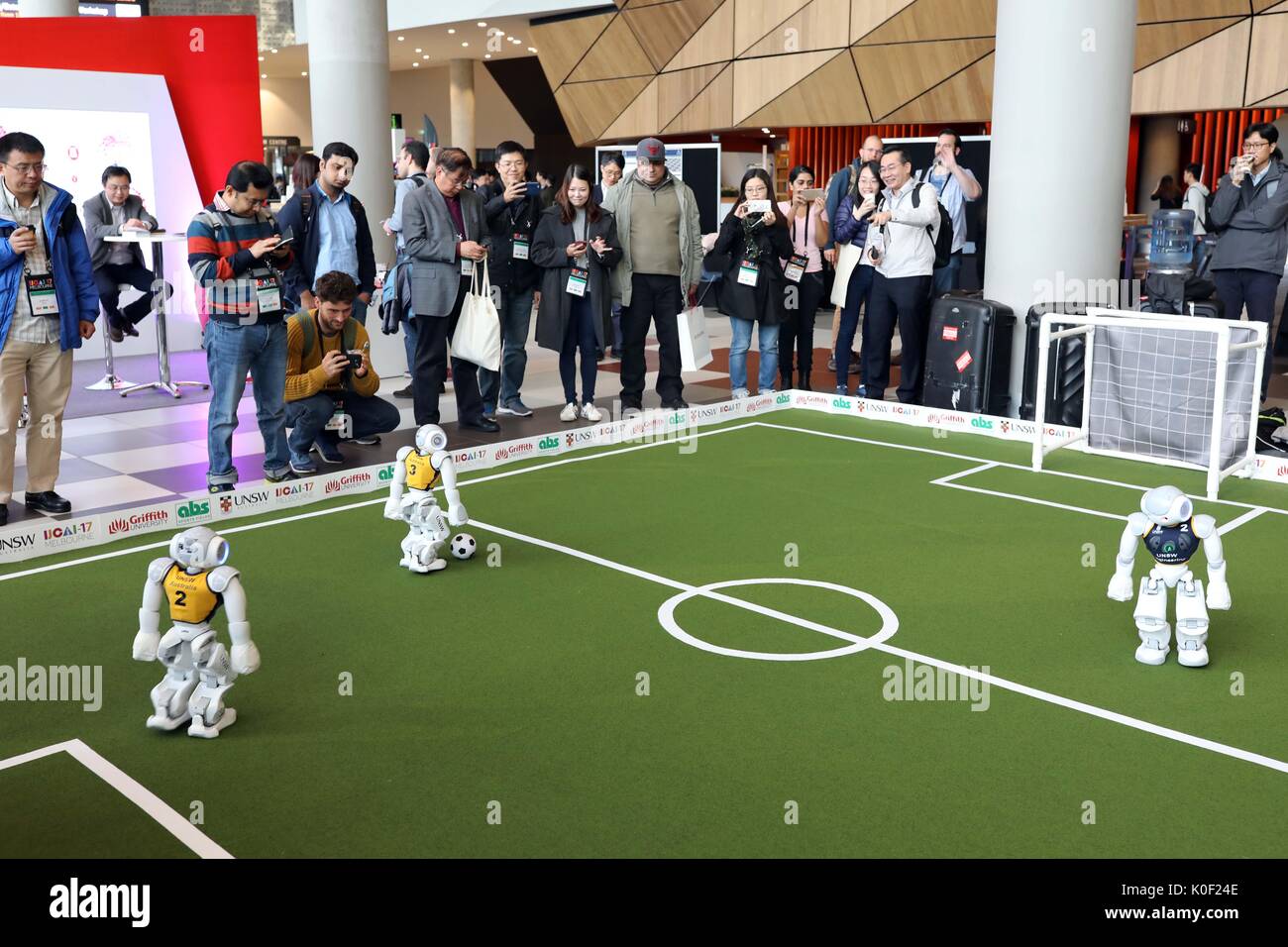 Melbourne, Australia. 23rd Aug, 2017. A robot football game is held during the 2017 International Joint Conference on Artificial Intelligence in Melbourne, Australia, Aug. 22, 2017. Credit: Xinhua/Alamy Live News Stock Photo