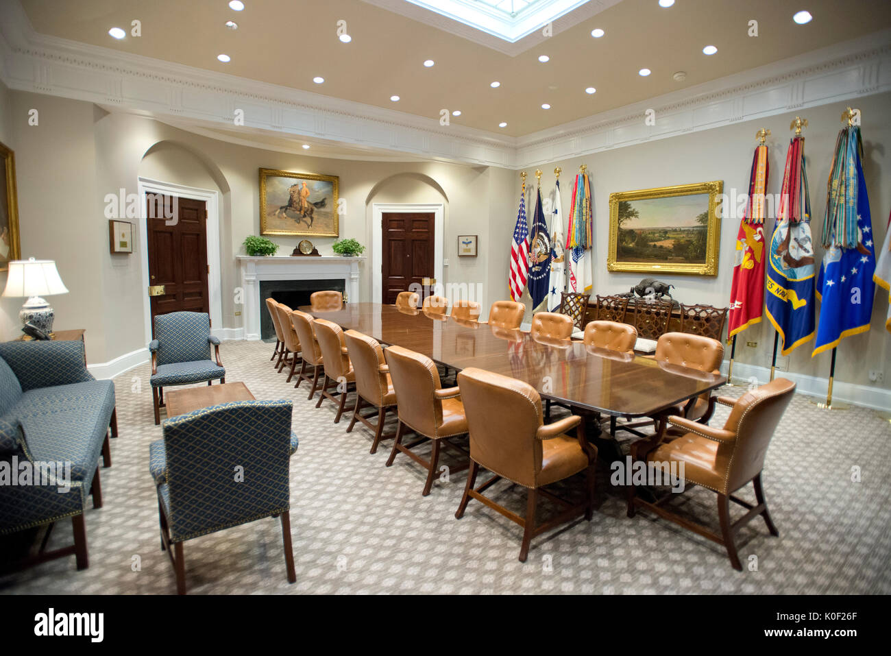 Very high resolution view of the newly renovated interior of the Roosevelt Room in the White House in Washington, DC on Tuesday, August 22, 2017. When seated at the table, the President's chair is the larger one in the center of the table in front of the American Flag. The doorway that leads to the hallway across from the Oval Office is the one on the right in the background near the center of the photo. The carpet is new. Credit: Ron Sachs / CNP     - NO WIRE SERVICE · Photo: Ron Sachs/Consolidated/dpa Stock Photo