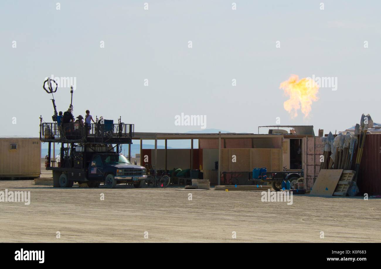 A pyrotechnics safety check is conducted on art installations on the playa before the start of the annual desert festival Burning Man August 21, 2017 in Black Rock City, Nevada. The annual festival attracts 70,000 attendees in one of the most remote and inhospitable deserts in America. Stock Photo
