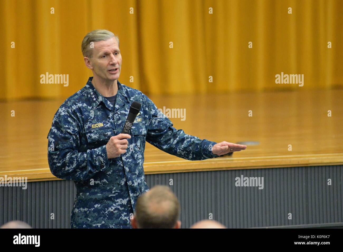 Okinawa, Japan. 23rd Aug, 2017. U.S. Navy Vice Adm. Joseph Aucoin, commander, U.S. 7th Fleet, addresses service members at Marine Corps Base Camp Foster January 19, 2016 in Okinawa, Japan. Aucoin was relieved of duty August 23, 2017 following a series of ship collisions resulting in the death of sailors under his command. Credit: Planetpix/Alamy Live News Stock Photo