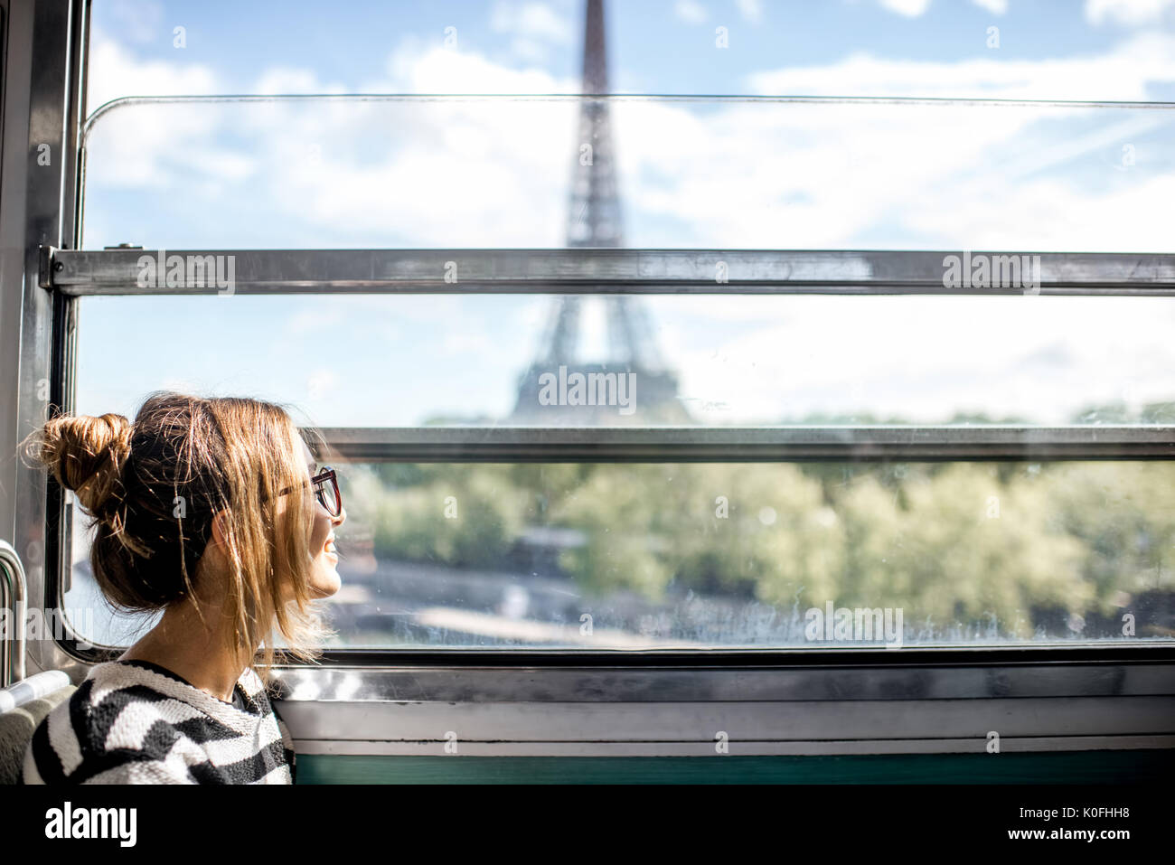 Woman in Paris subway train Stock Photo