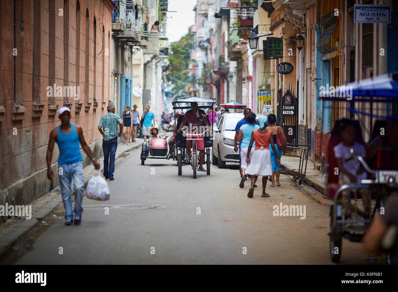 Cuban, cuba, Capital, Havana typical narrow street with apartments and shops Stock Photo