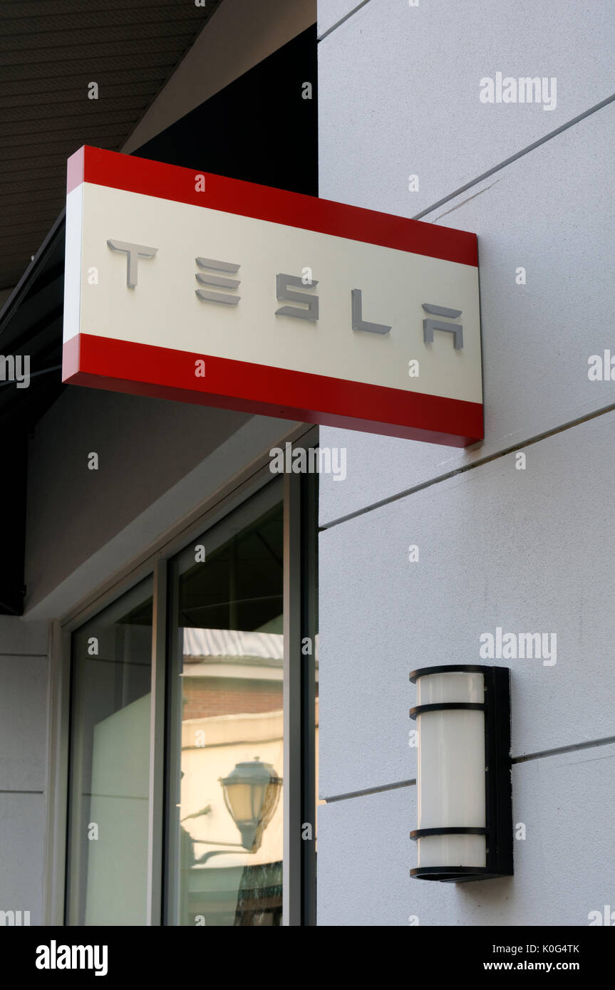 Tesla logo sign outside an automobile dealership in Vancouver, BC, Canada Stock Photo