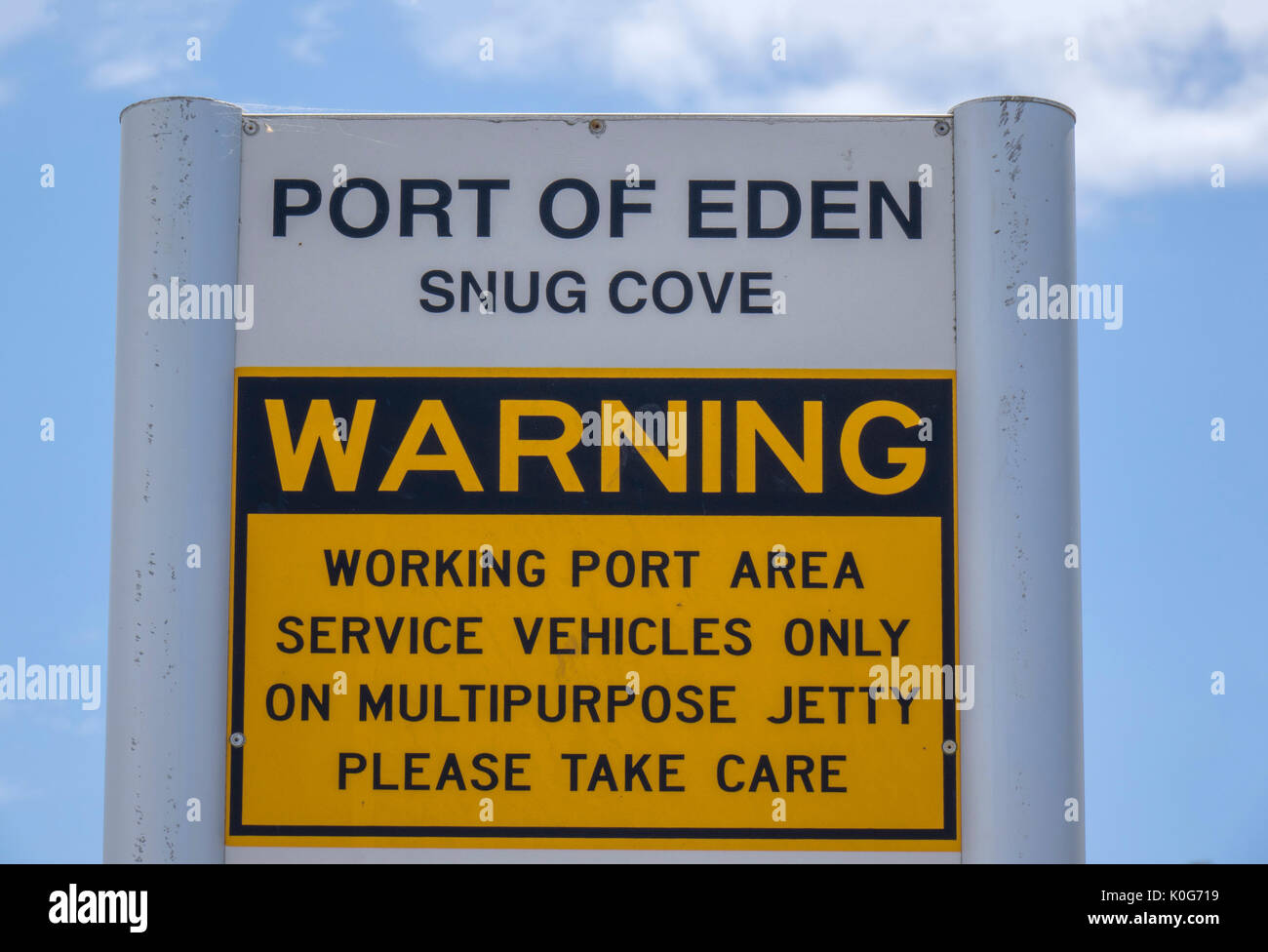 The Port Of Eden On Twofold Bay Warning Sign To The Public To Take Care Around The Harbour Eden New South Wales Australia Stock Photo