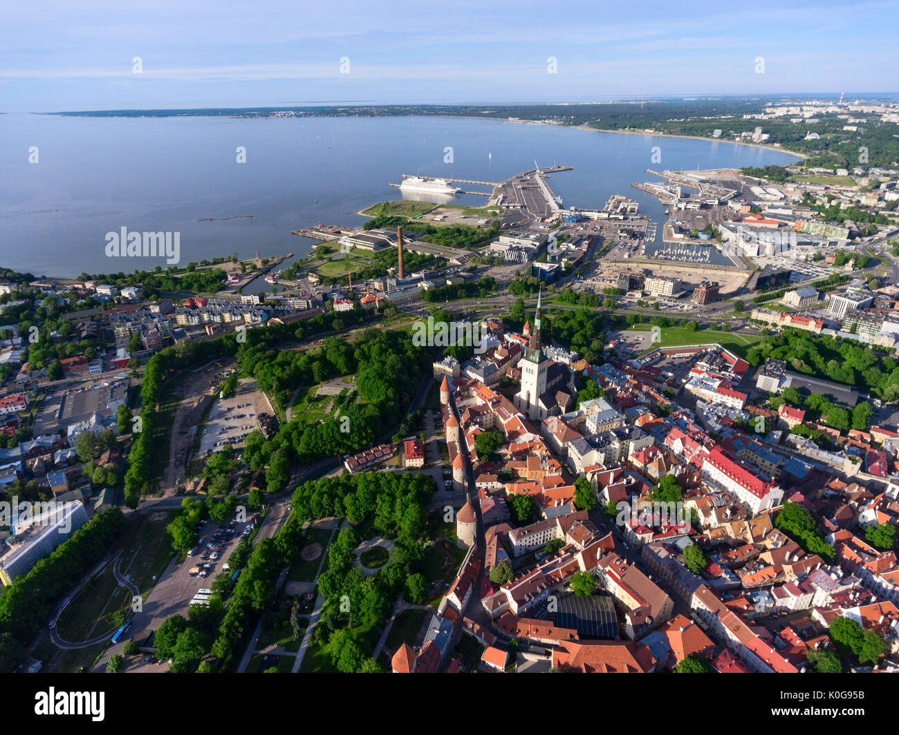 Panorama of Tallinn city with Old town, port in Gulf of Finland and urban modern buildings. Aerial view Stock Photo