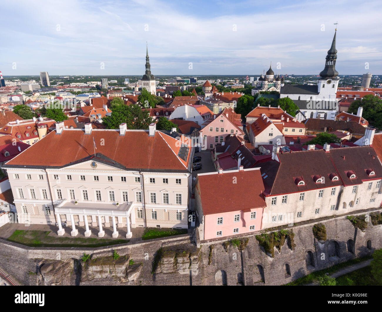 Building of government of Estonia and Church of St. Nicholas on background. The Old Town of Tallinn. Aerial view. Estonia, Europe Stock Photo