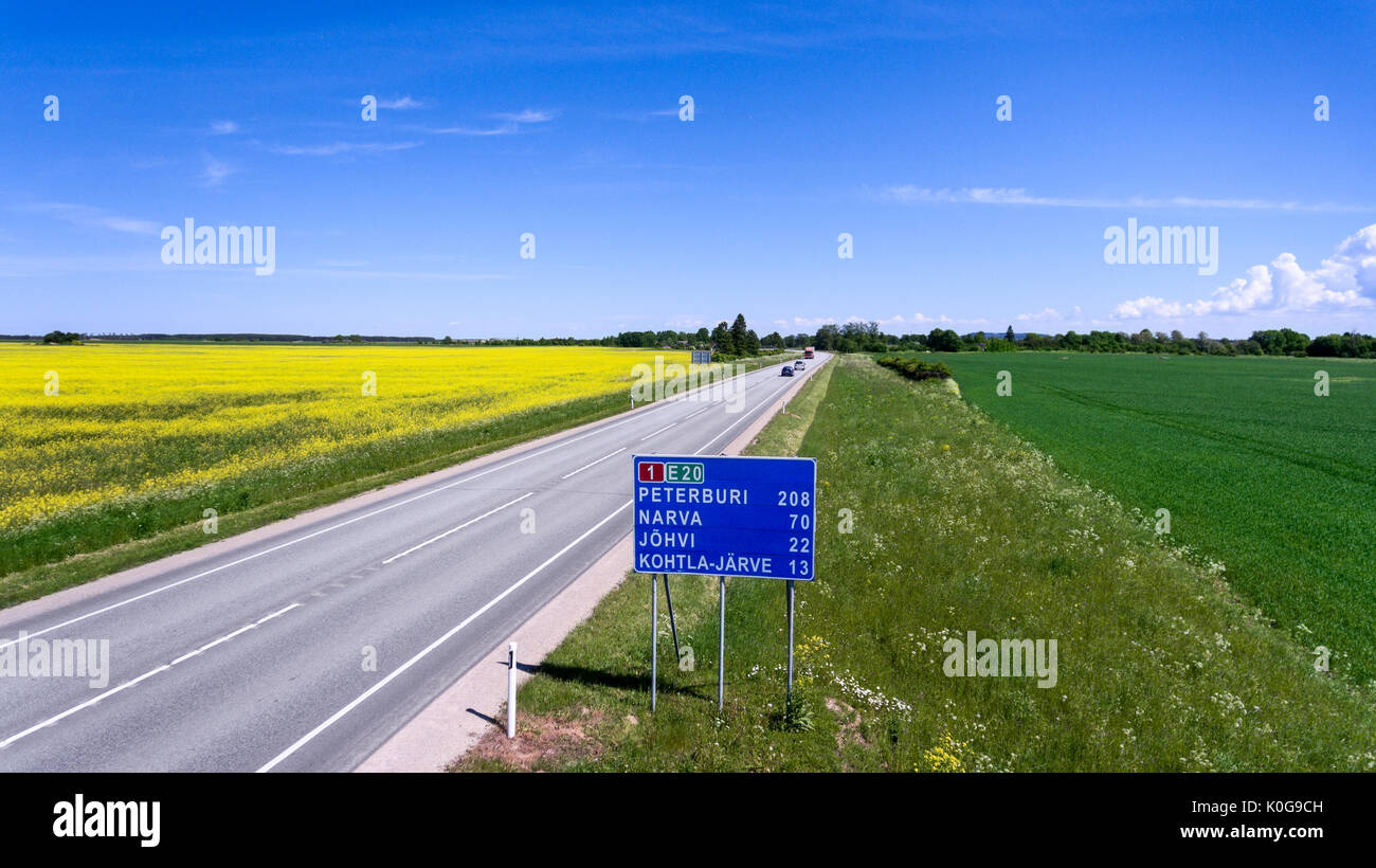 Road-sign with distances is on E20 route from Tallinn to Narva city. E 20 is the part of European national road and the main number 1 in Estonia Stock Photo