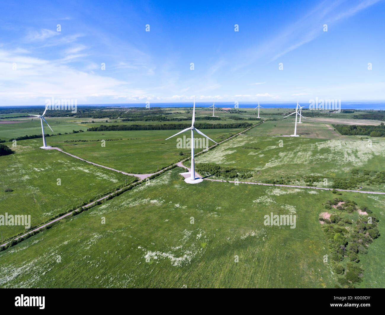 Onshore windmill park with turbines for electricity producing. Aerial