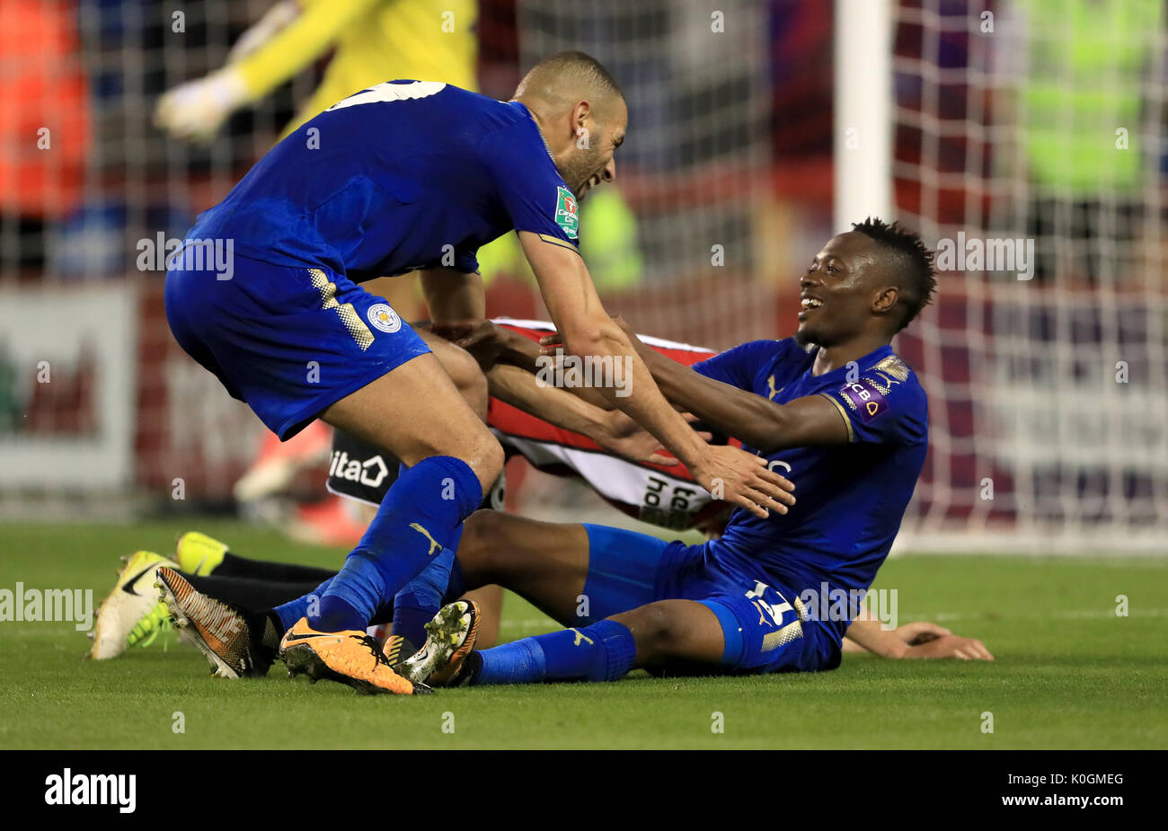 Leicester City's Ahmed Musa celebrates scoring his side's fourth goal of the game with team mates during the Carabao Cup, Second Round match at Bramall Lane, Sheffield. Stock Photo