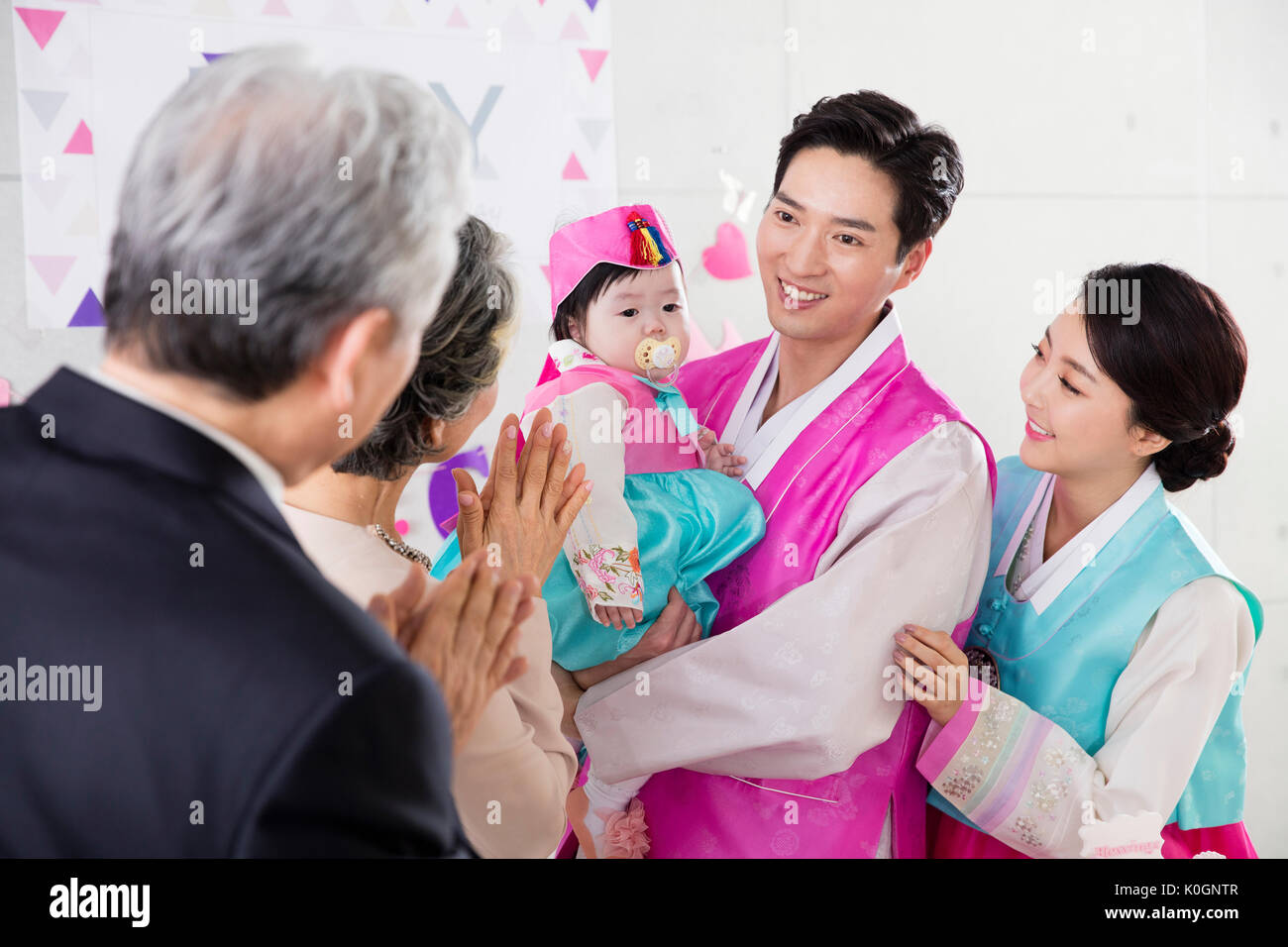 Portrait of harmonious big family at first birthday party Stock Photo