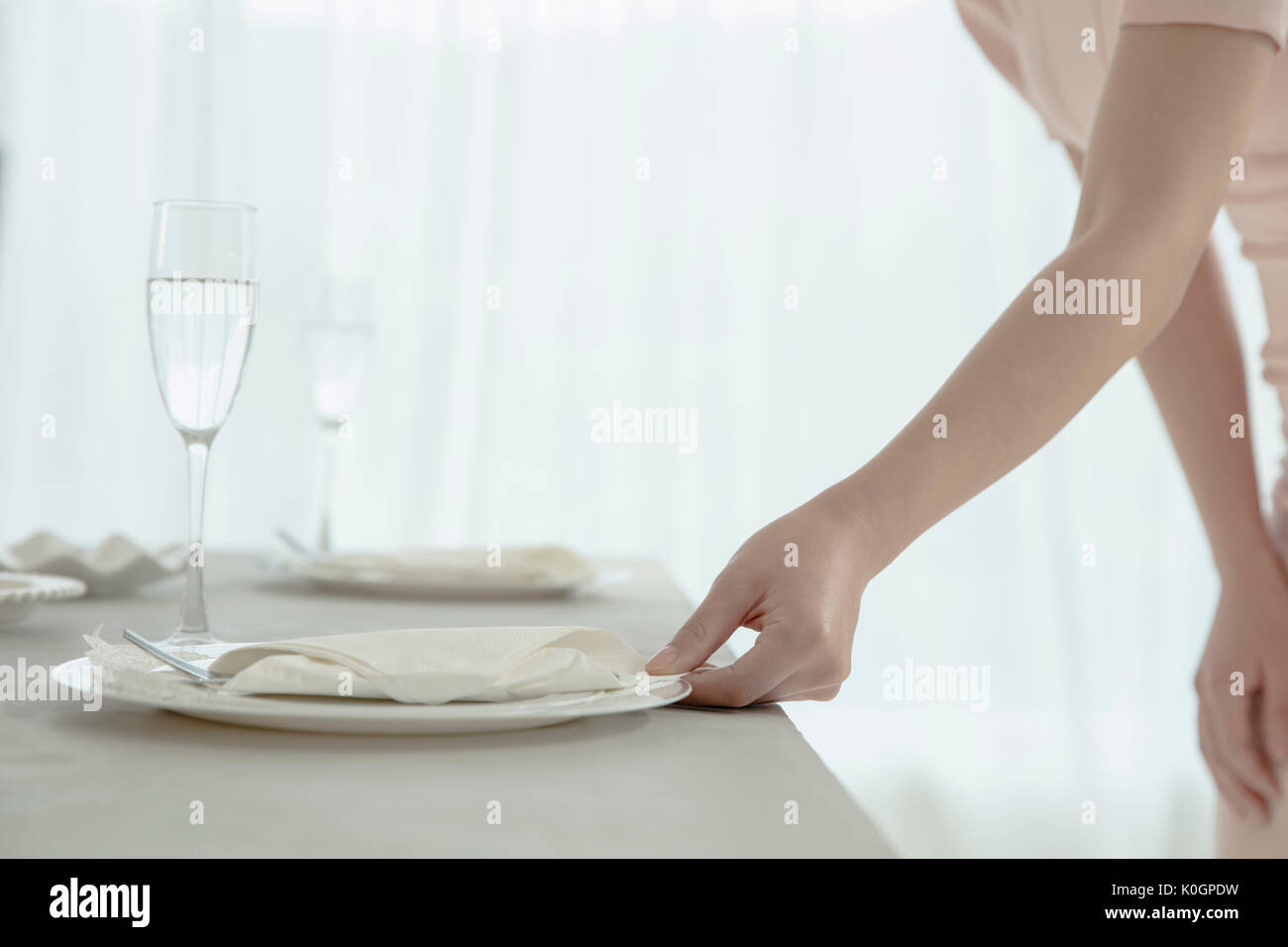Woman holding a dish at party Stock Photo