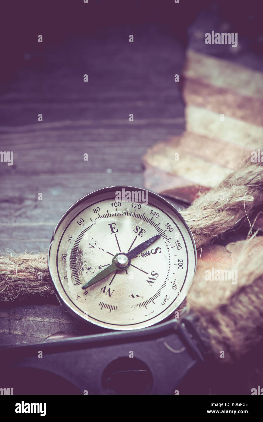 Columbus day and world map with compass Stock Photo - Alamy