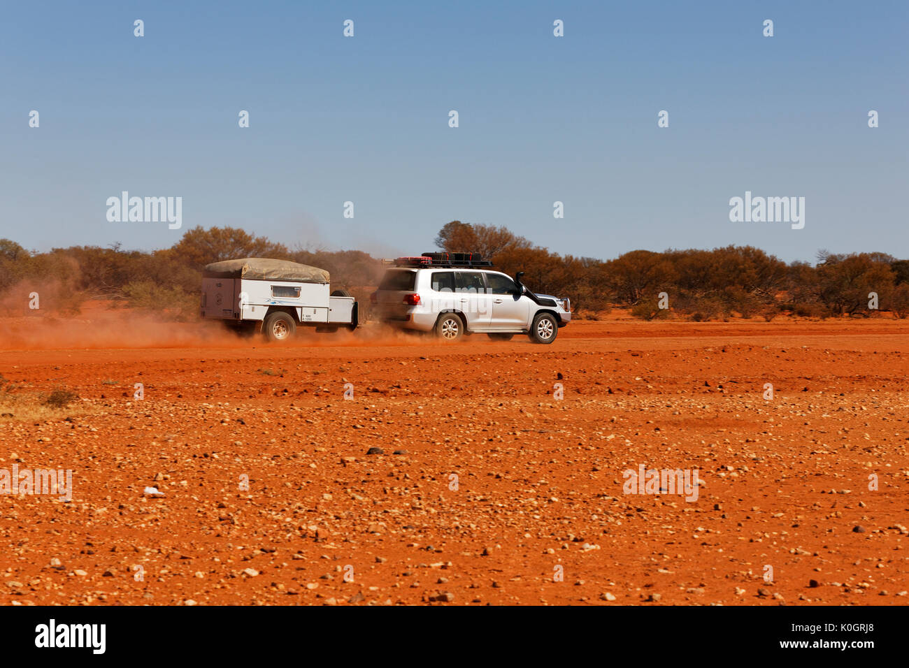 Car and Camper Trailer, travelling on a red dirt road in the Australian  outback, Gascoyne, Western Australia Stock Photo - Alamy