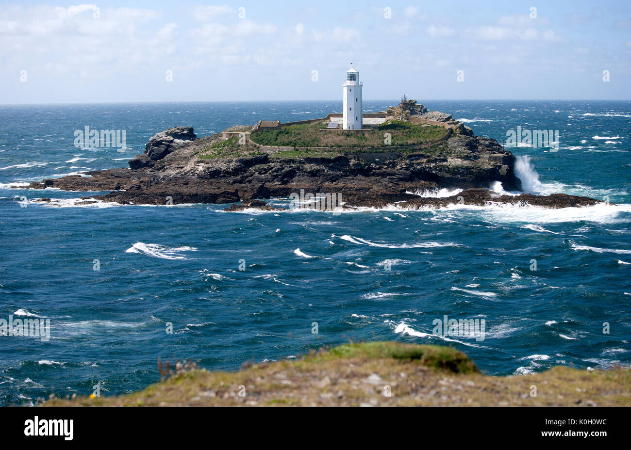 Godrevy Lighthouse, St Ives Bay, Cornwall, UK, shipwrecks and waves Stock Photo