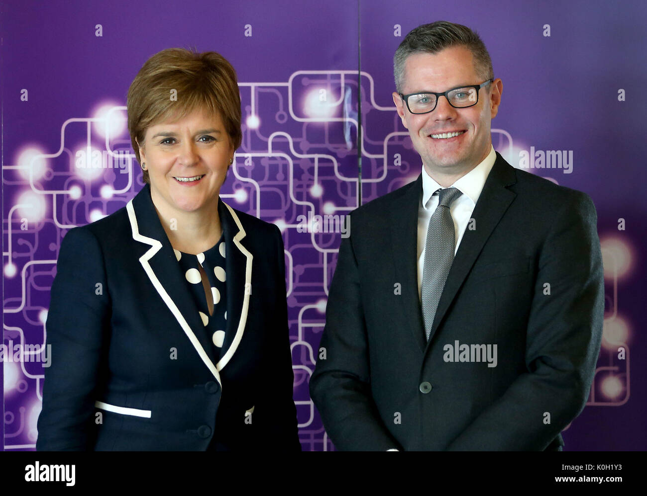 First Minister Nicola Sturgeon and Finance Secretary Derek Mackay during their visit to life sciences business, Aquila Biomedical, a cancer treatment research company based at Edinburgh Bioquarter, as the annual Government Expenditure and Revenue Scotland 2016-17 (GERS) report is published. Stock Photo