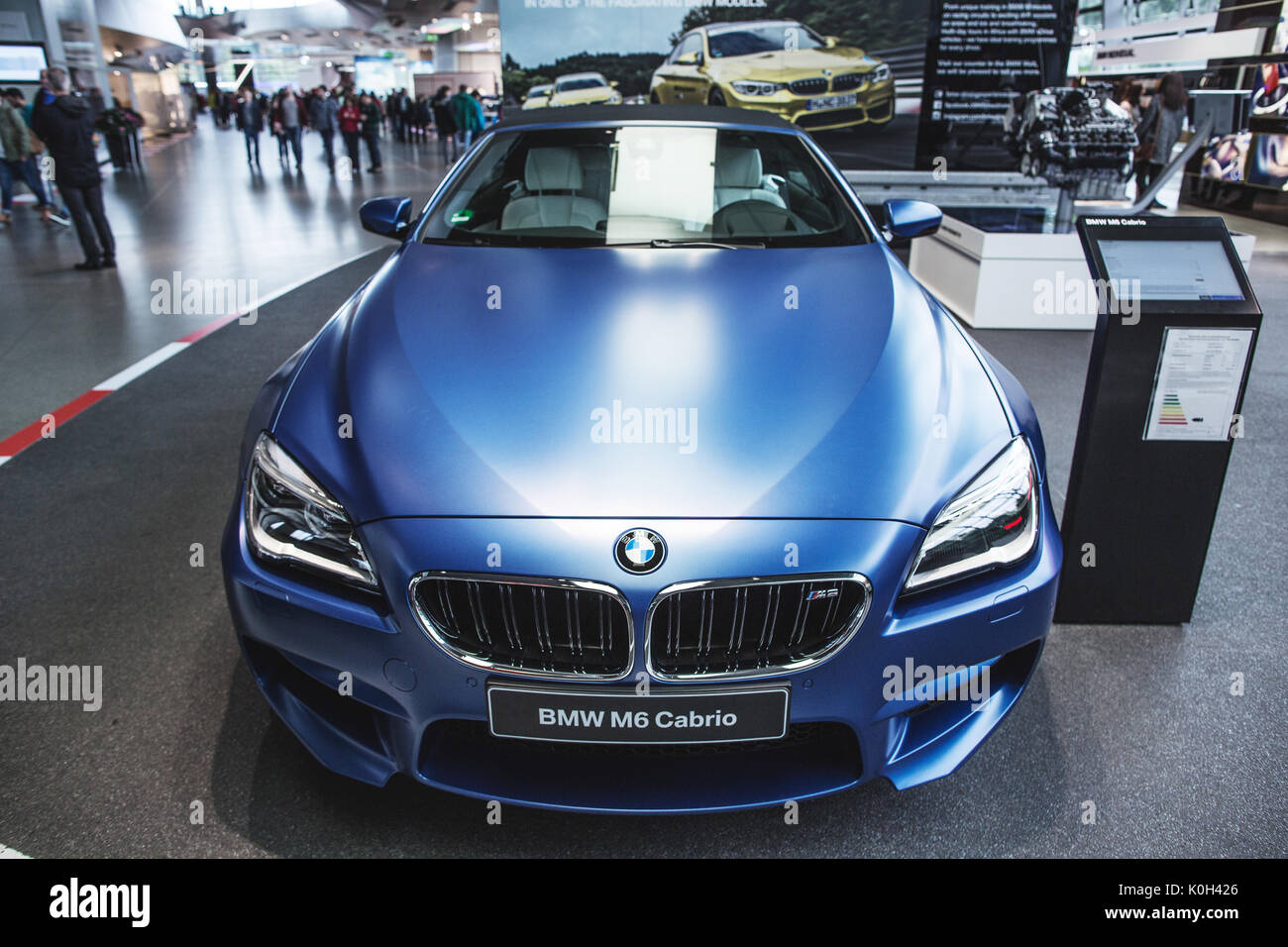 Munich, Germany - May 24, 2016. A blue BMW M6 Cabrio at the BMW Welt also  known as the BMW World in Munich, Germany. The BMW World was designed by  the Austrian